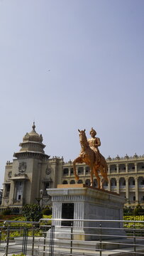 Kempe Gowda statue in front of famous stunning Vidhana Soudha.