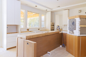 Assembling new kitchen cabinets interior as home improvement
