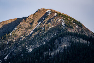sunset in the mountains with blue sky