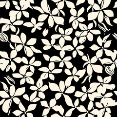 Abstract beige plumeria flowers. On a black background, a seamless pattern