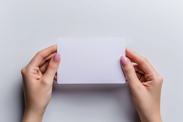 Obraz premium Holding blank paper in both hands