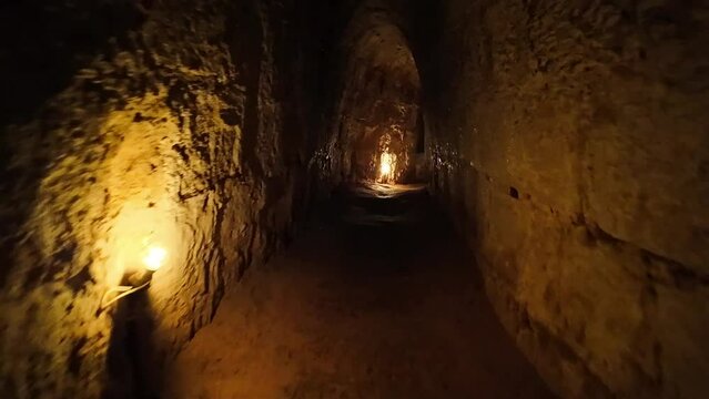 Indoor Cu Chi tunnel, historic underground dugout of Vietnamese war, famous destination sites for Ho Chi Minh city travel