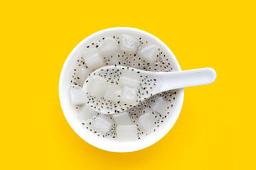 Coconut jelly with basil seeds in syrup