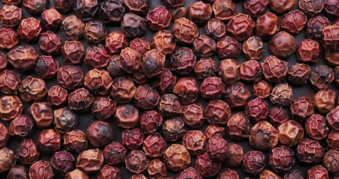 Top view of dry red kampot pepper footage 360&deg; full rotation in 4k