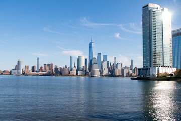 Fototapeta premium New York, United States. New York city skyline in Midtown Manhattan. USA, NYC, NY, Manhattan. American big city. Lower Manhattan skyline. New York from New Jersey. Downtown Manhattan with blue sky.