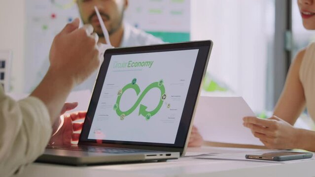 ESG ( environment, social,governance)  circular economy on laptop screen with carbon free chart board in office