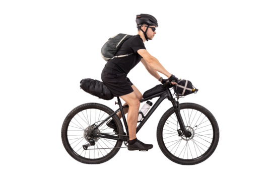 Cyclist on Touring Mountain Bike with Bags Isolated from Background - Powered by Adobe