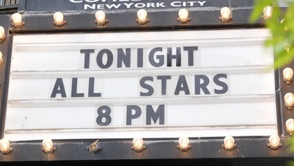 Retro marquee sign and light bulbs. Movie theater or cinema theatre vintage facade signage. Letters about tonight show. New York City street iconic old architecture, USA. Performing arts advertisement
