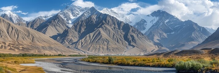 Scenic River Valley with Snow-Capped Peaks: Majestic landscape view of river valley surrounded by snowy mountains, serene natural beauty