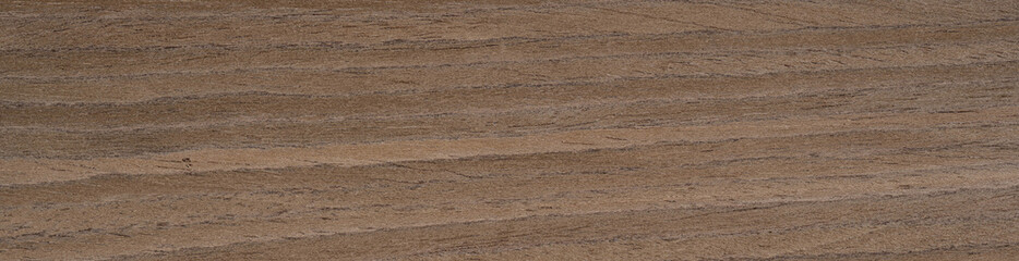 Swirls of chestnut and espresso flow through this walnut burl veneer, offering a mesmerizing, earthy tableau