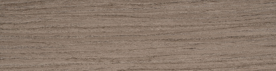Subtle earth tones of taupe and ash flow through this walnut veneer, evoking a sense of quiet sophistication