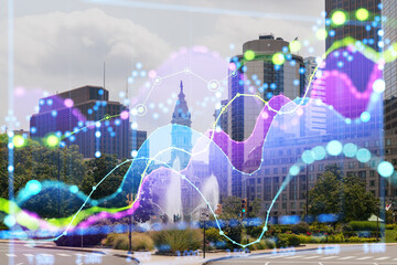 Philadelphia skyline with a holographic graph overlay. Photo manipulation with a cityscape background. Future technology and business concept. Double exposure