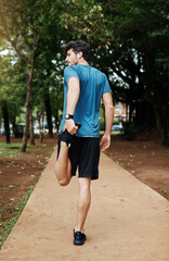 Fototapeta premium Man, back and fitness stretching or leg, muscle preparation and cardio exercise with runner or athlete. Performance, body wellness and morning routine in park for training for running marathon