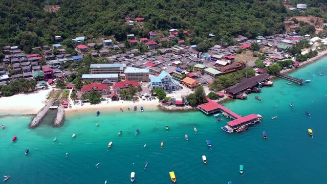 Terengganu, Malaysia, March 16, 2023 Aerial moving backward reveals the area in the Pulau Perhentian kecil. 4K