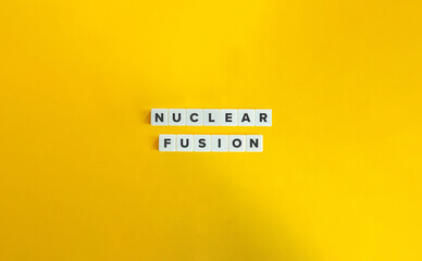 Nuclear Fusion Term. Text on Block Letter Tiles on Flat Background. Minimalist Aesthetics.