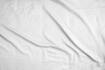 Abstract white wrinkled bedding sheet fabric texture background