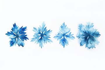 Three blue flowers on a white surface, ideal for backgrounds and designs