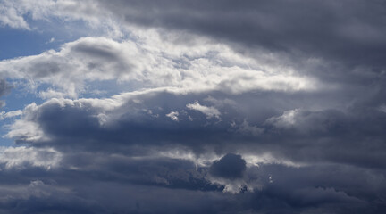 Blue sky with beautiful clouds. Natural background.