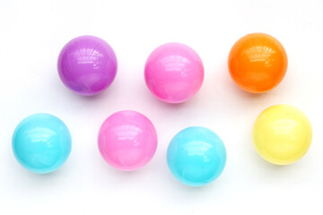 Colorful balls on white background.