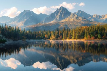 A panoramic view of a serene lake nestled amongst the majestic High Tatras mountains during autumn, capturing the breathtaking reflection of the towering peaks in the crystal-clear water