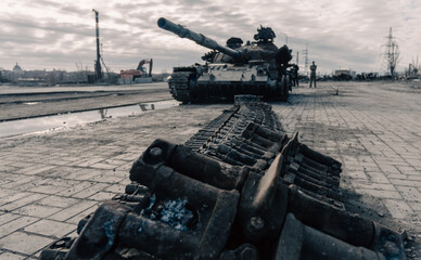 destroyed battle tank in a city lost during the war in Ukraine