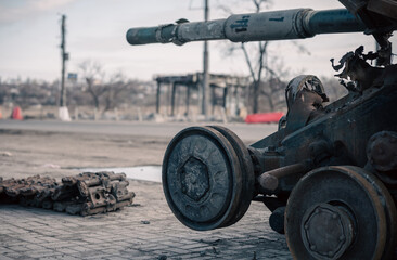 destroyed battle tank in a city lost during the war in Ukraine