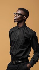 Fototapeta premium A man in a black button-down shirt gazes upwards