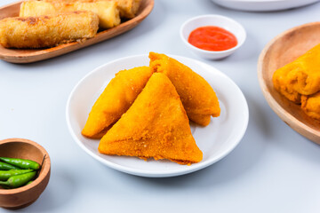 Risol or rissoles. served with chili sauce or chili. perfect for recipe, article, catalogue, promotion, or any cooking contents. with copy space.