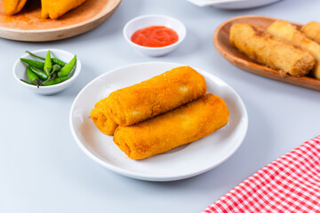 Risol or rissoles. served with chili sauce or chili. perfect for recipe, article, catalogue, promotion, or any cooking contents. with copy space.
