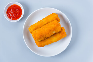 Risol or rissoles. served with chili sauce or chili. perfect for recipe, article, catalogue, promotion, or any cooking contents. with copy space.