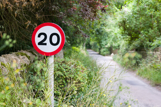 20mph speed limit sign on a narrow country road, Oxfordshire, UK