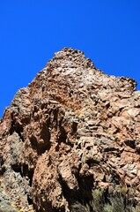 Scenic view of volcanic rock formations in desert during sunny day, Teide National Park, Tenerife