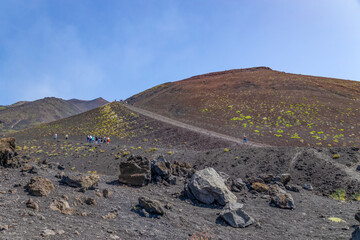 Piles of volcanic lava on the slopes of the Etna volcano in a lunar landscape, province of Catania, Sicily, Italy