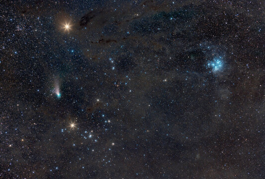 Comet in front of celestial background with other deep sky objects