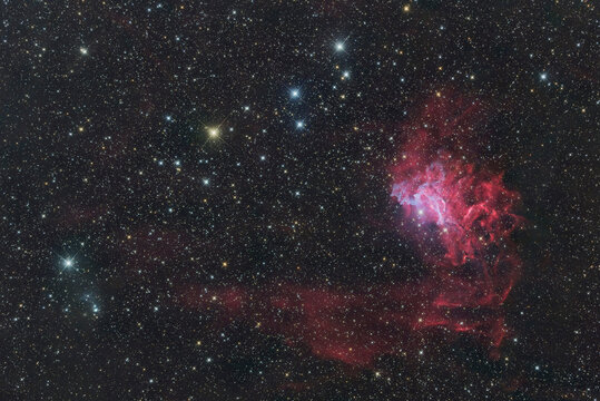 Long exposure astrophoto with telescope featuring emission and reflection Nebula IC 405