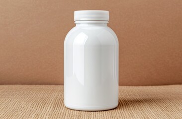 White plastic bottle with lid on beige background