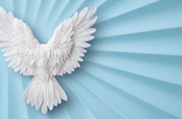 Fototapeta premium Angelic white feather wings against a blue sky