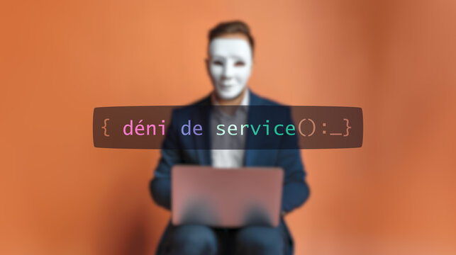 Cybersecurity concept d&eacute;ni de service on foreground screen, hacker silhouette hidden with low poly style mask. Vulnerability and attack on colored code editor. Text in English, English text