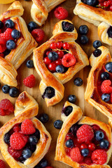 Homemade puff pastry pies with fruit