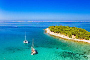 Turquoise sea, islands and yachts in Murter archipelago in Dalmatia, Croatia