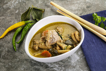 Thai green curry soup with basil