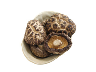 A pile of shiitake mushrooms on a white background