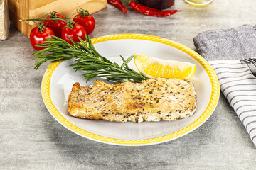 Baked salmon fish served rosemary