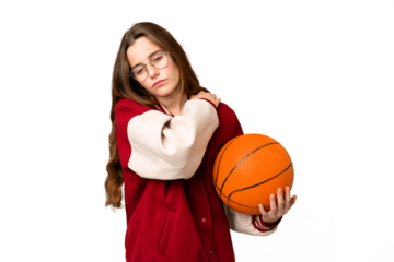 Teenager girl playing basketball over isolated chroma key background suffering from pain in shoulder for having made an effort