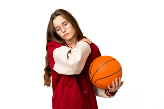 Teenager girl playing basketball over isolated chroma key background suffering from pain in shoulder for having made an effort