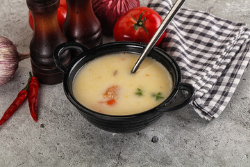 Salmon cream soup with vegetables