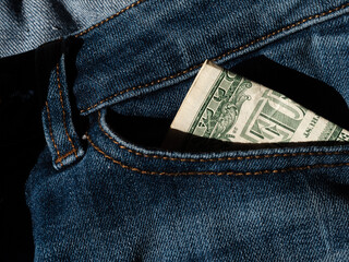 Dollar in jeans pocket 
