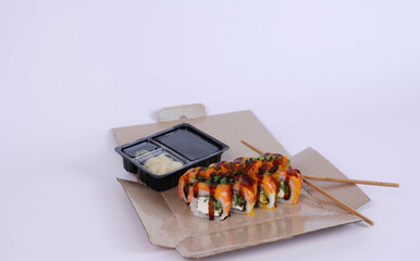 sushi delivery box with soy sauce. High quality photo