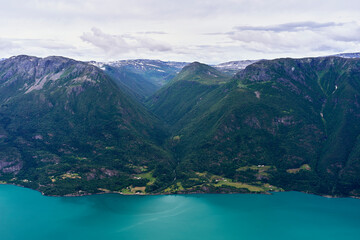 Obraz premium View towards the Krokadalen Valley seen from the Molden Mountain by the Lustrafjorden Fjord, Norway.