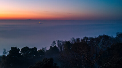 The golden island. Grado Island from above at sunset.